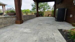 Travertine stone paver patio install in Frisco, Texas