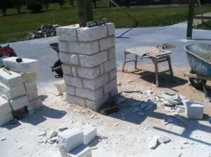 Stone Columns Around Pergola Post